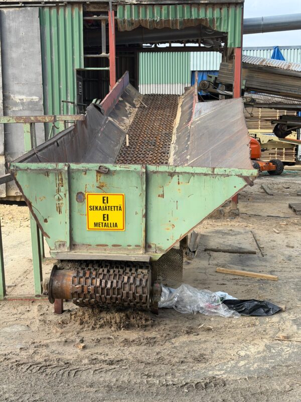 Koksnes atgriezumu transportieris